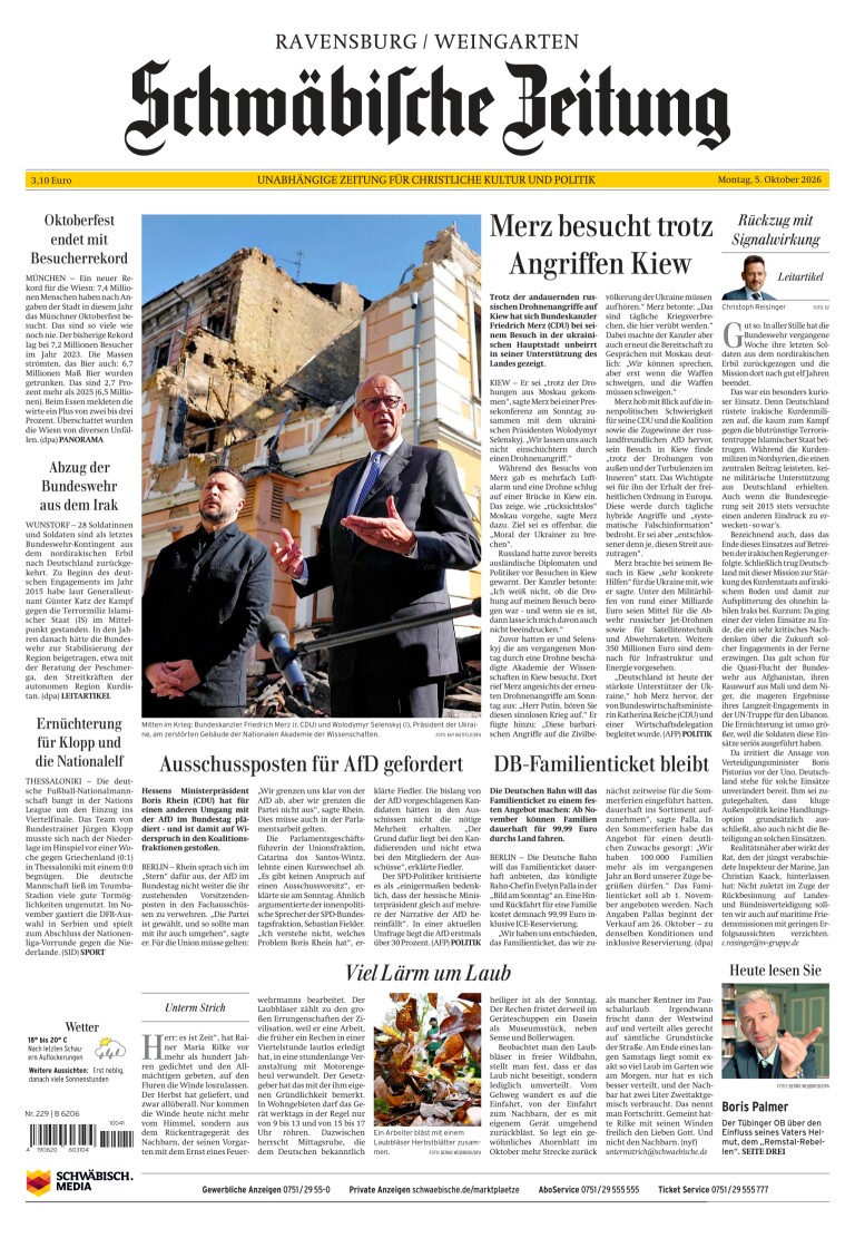 Schwäbische Zeitung front page, 5 October 2026. Headline: Merz visits Kyiv despite attacks.